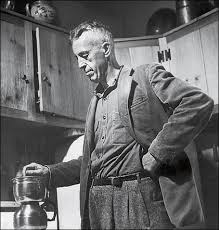 black and white picture of founder of alcoholics anonymous in a kitchen