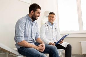 an addiction treatment specialist an at addiction treatment center in tampa consults with a new client