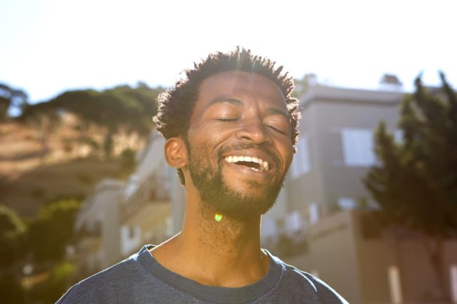 man happy after learning how recovery can transform you