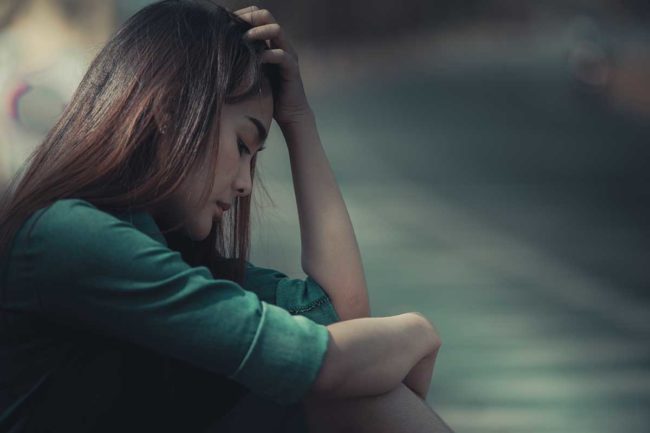 bipolar-disorder-and-drug-addiction Woman struggling with bipolar disorder and drug addiction