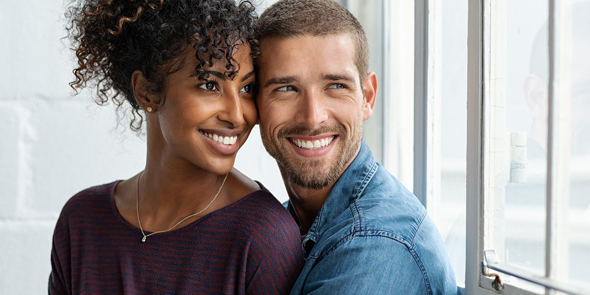 man and woman smiling knowing about covid-19 pandemic and rehab