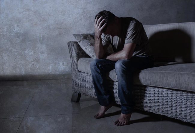 When to Seek Help for Depression man struggles with depression and wonders when its time to seek help