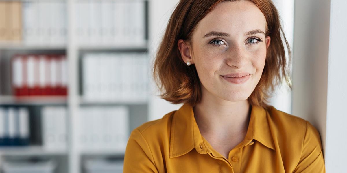 woman learns about the benefits of TMS therapy
