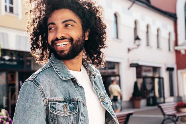 a man feels well adjusted in his first year of sobriety thanks to recovery resources like his sober living program