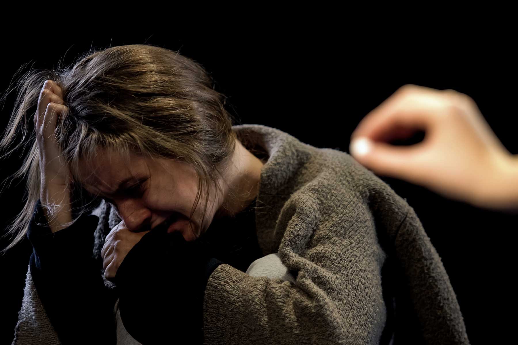 A woman experiencing cocaine withdrawal symptoms