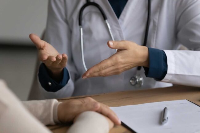 Therapist explaining the importance of medical detox to a patient