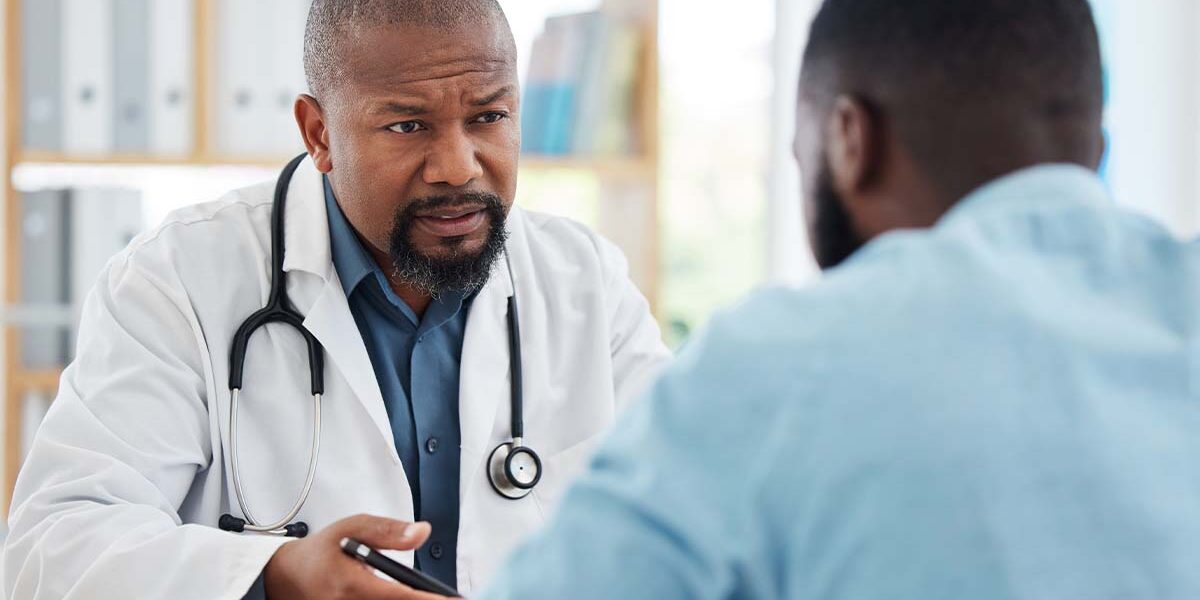 Dangers of Mixing Cocaine and Alcohol Doctor discusses cocaine and alcohol use with a patient