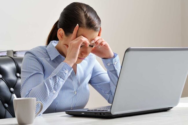 Recognizing Depression at Work A woman dealing with depression at work