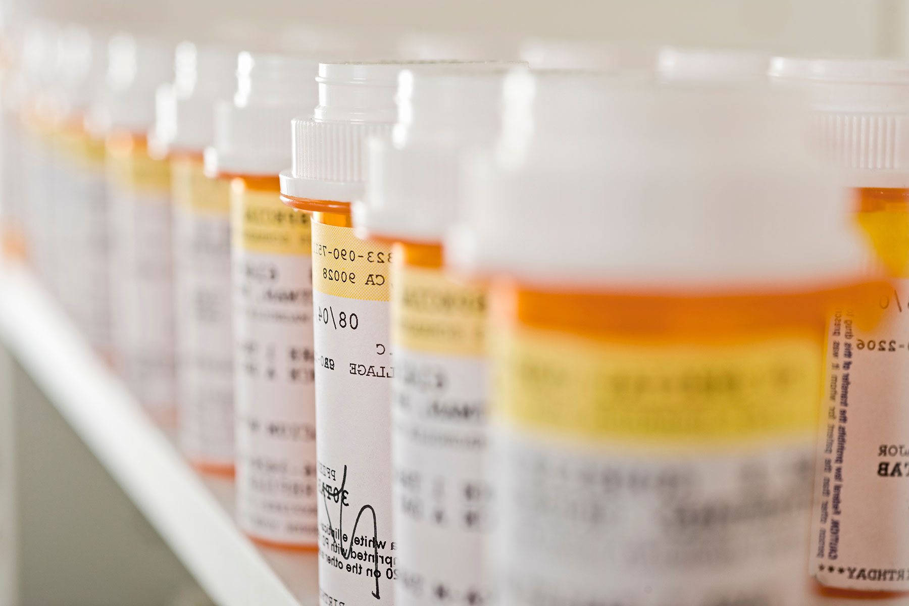 The Effects of Opioids on the Brain Row of opioid bottles, illustrating the drug's effects on the brain